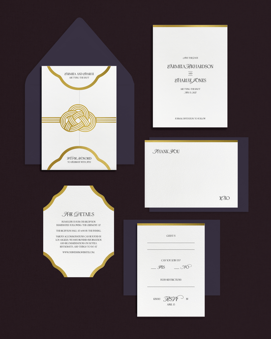 8-piece wedding stationery set that has white gate-fold invitation, save the date card, details card, thank you card, and RSVP card, all with gold foil accents