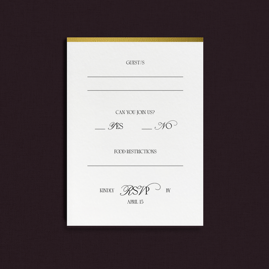 White RSVP card with gold foil accent